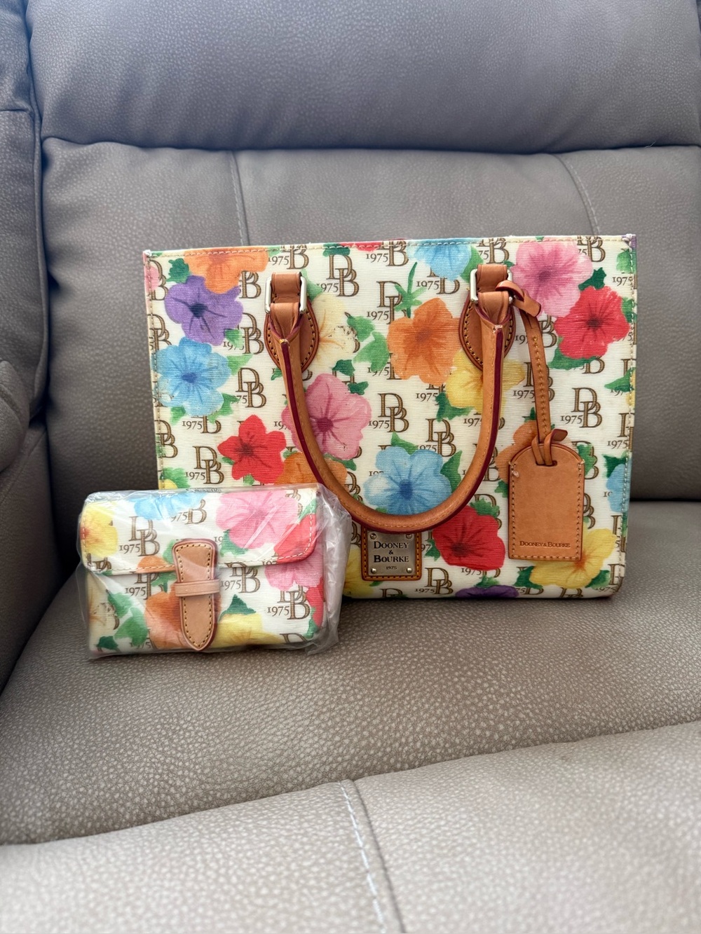 Used Dooney and Burke Floral Janine Signature bag with new matching wallet
